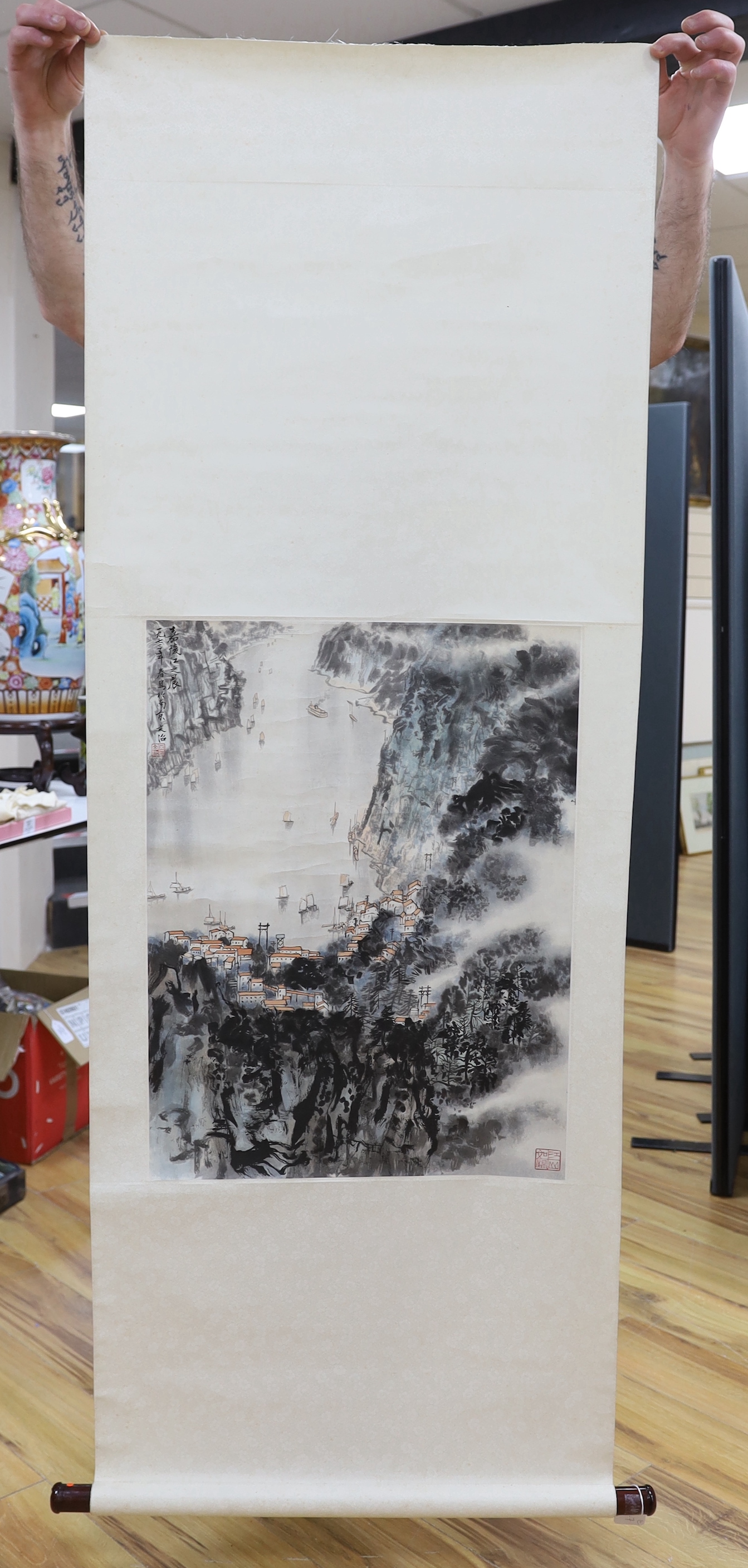 A 20th century scroll painting of a harbour scene and a Japanese scroll painting of a bird of prey, longest 165cm